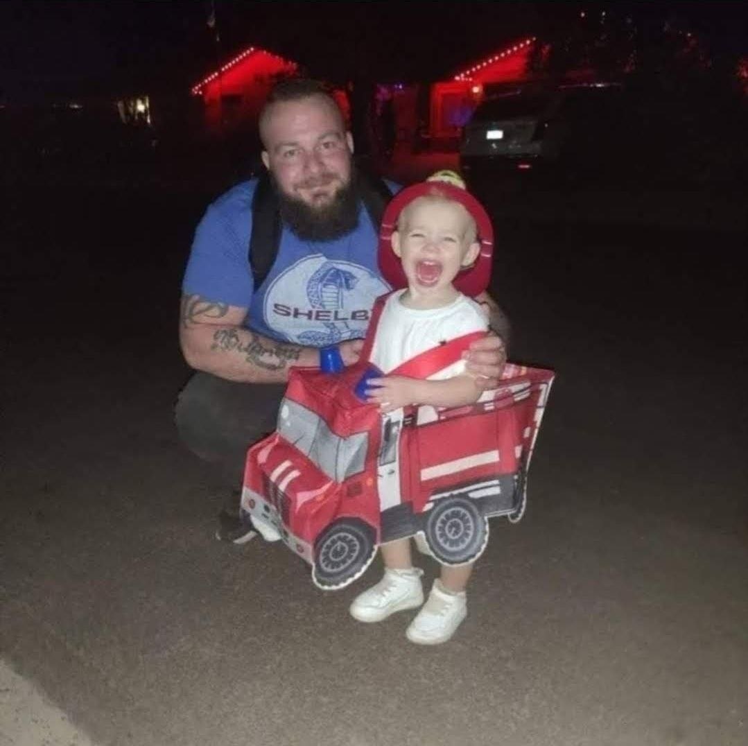 Family photograph of the author with his young son.